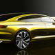 Image for article titled What's This Sexy AWD Hybrid Volkswagen Four-Door Coupe Concept?